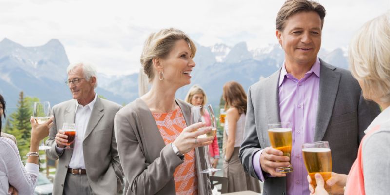 Group of people drinking at a networking party